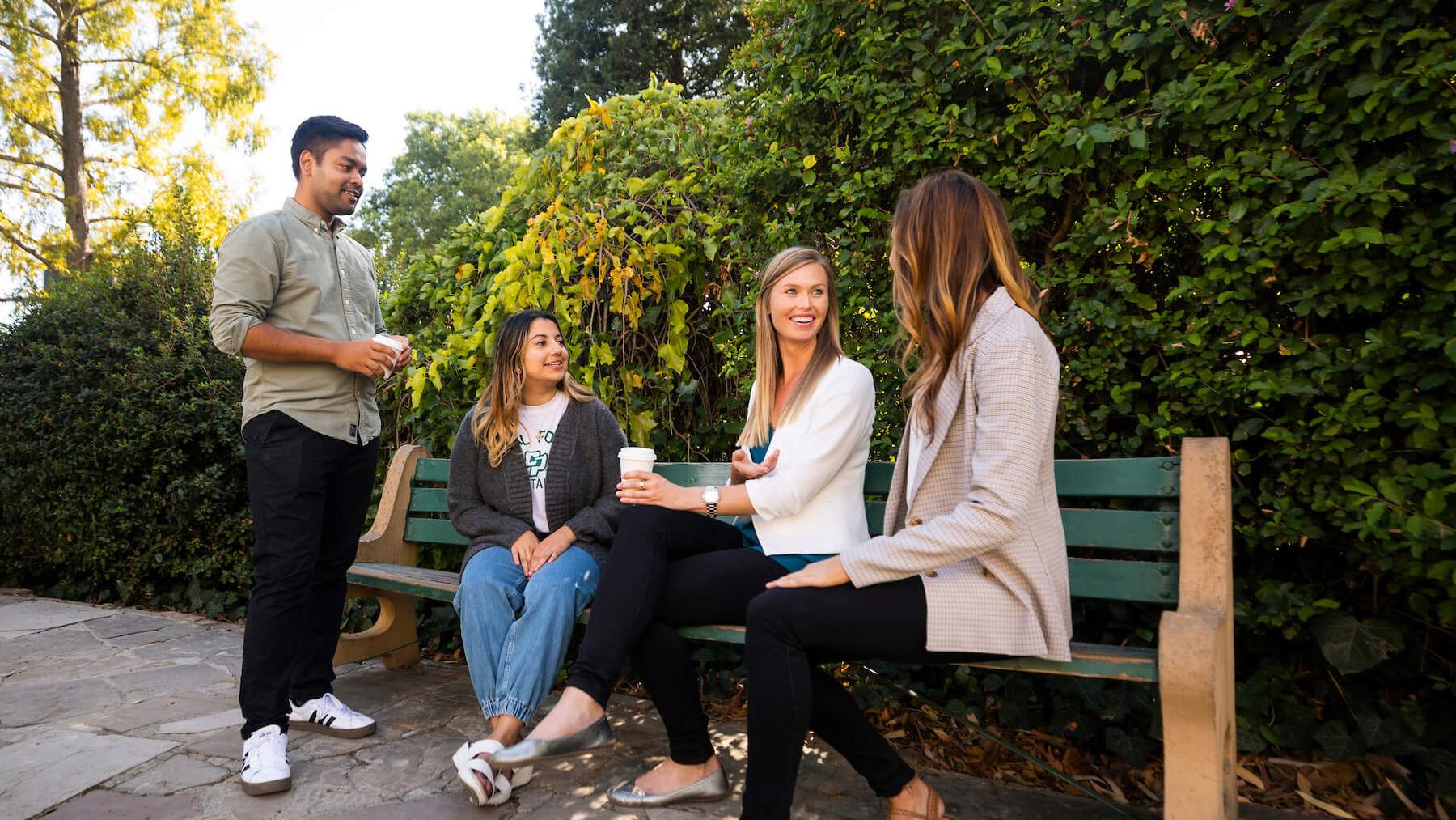 Prospective graduate students talking on campus