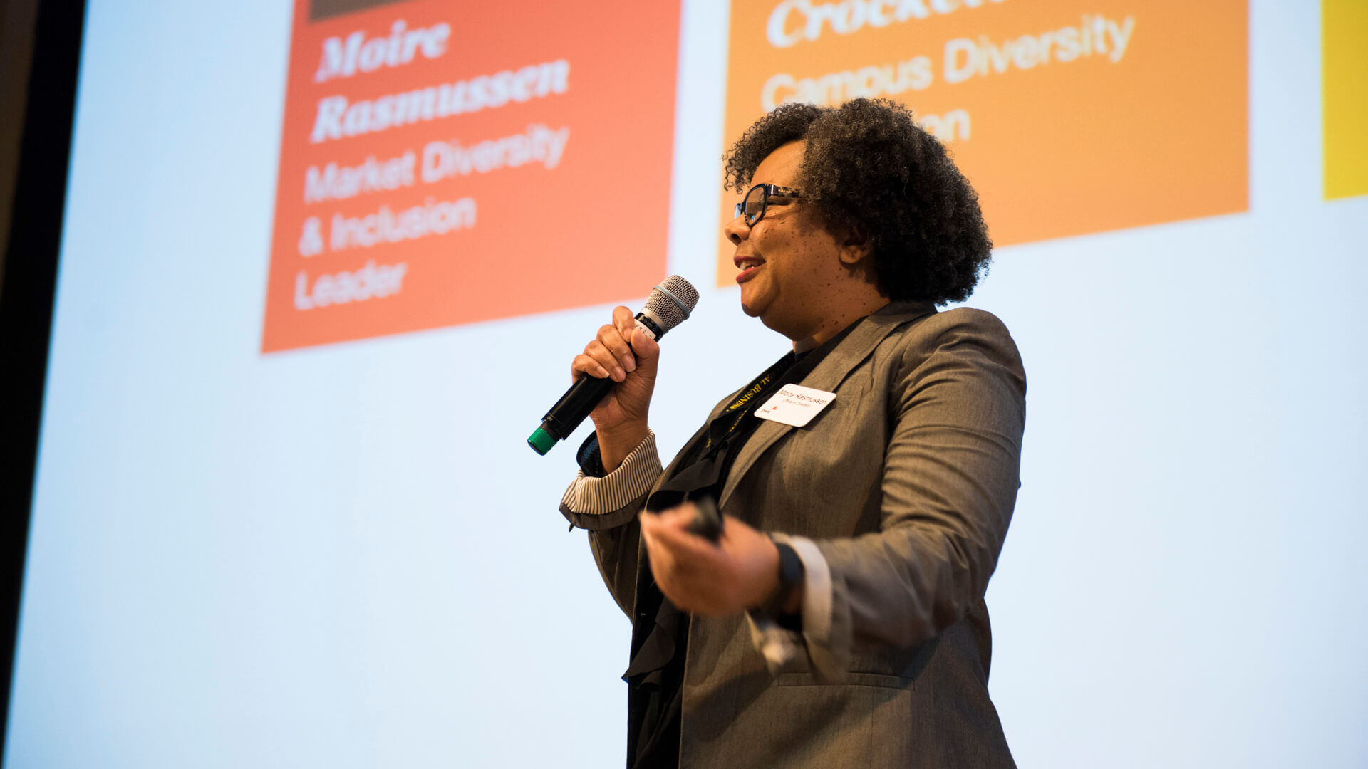 Speaker on stage at a conference