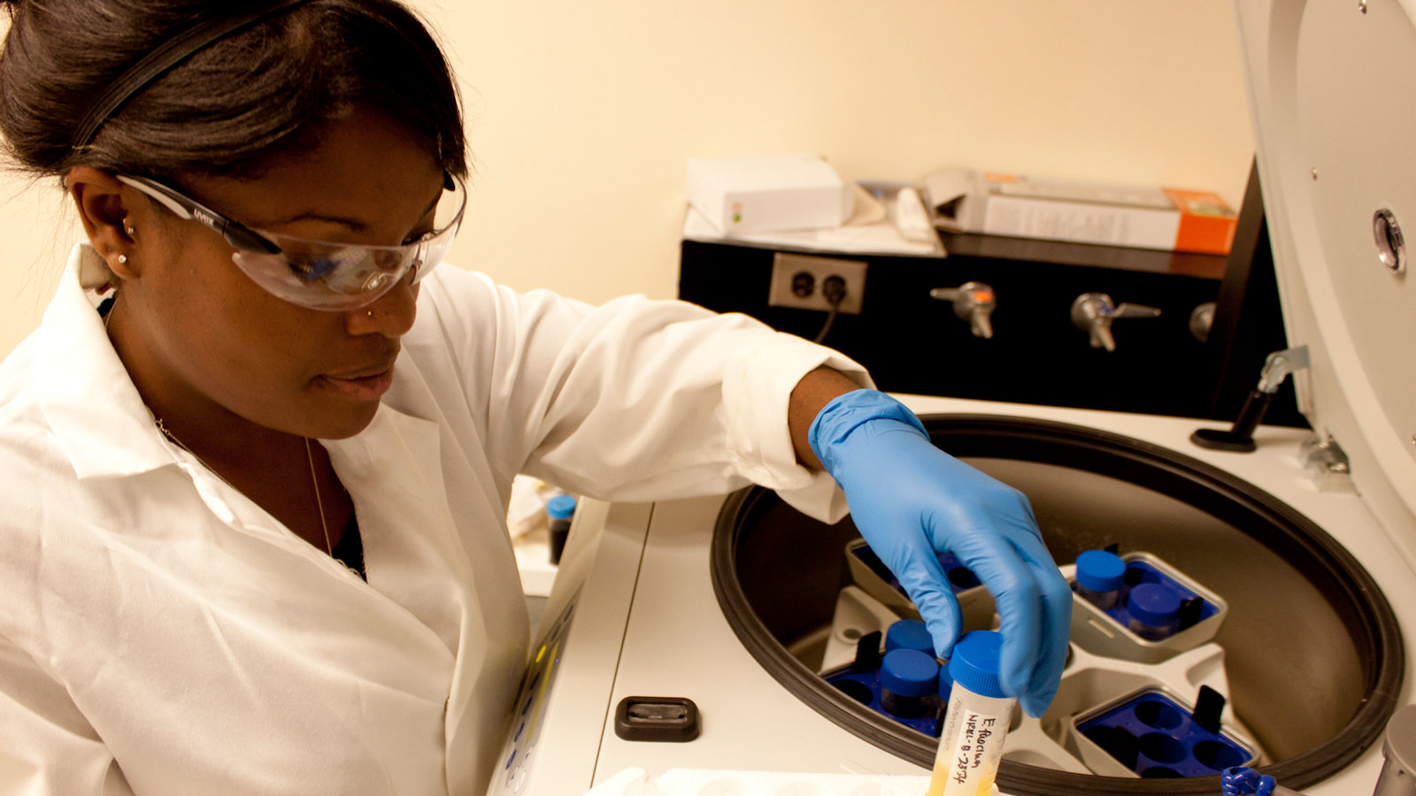 Student with centrifuge